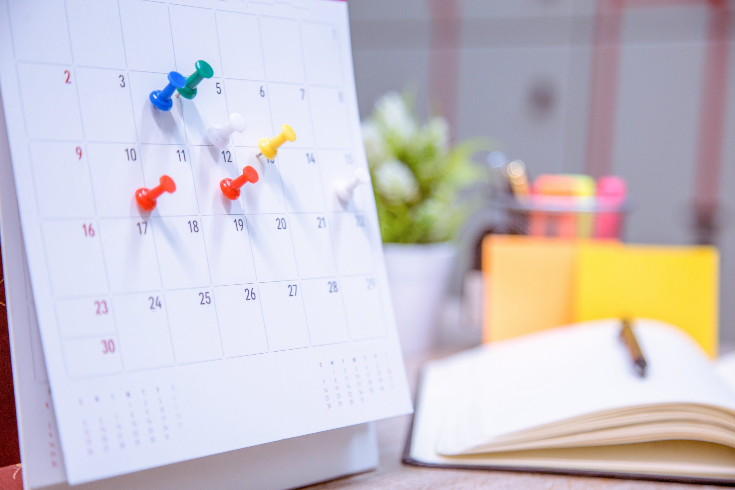 Calendar Event Planner is busy.calendar,clock to set timetable organize schedule,planning for business meeting or travel planning concept.